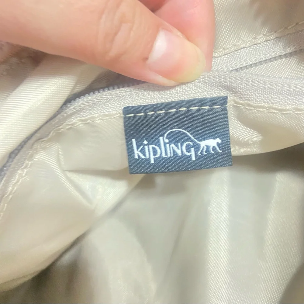 Rose Gold Kipling Pink Crossbody Bag with Signature Style